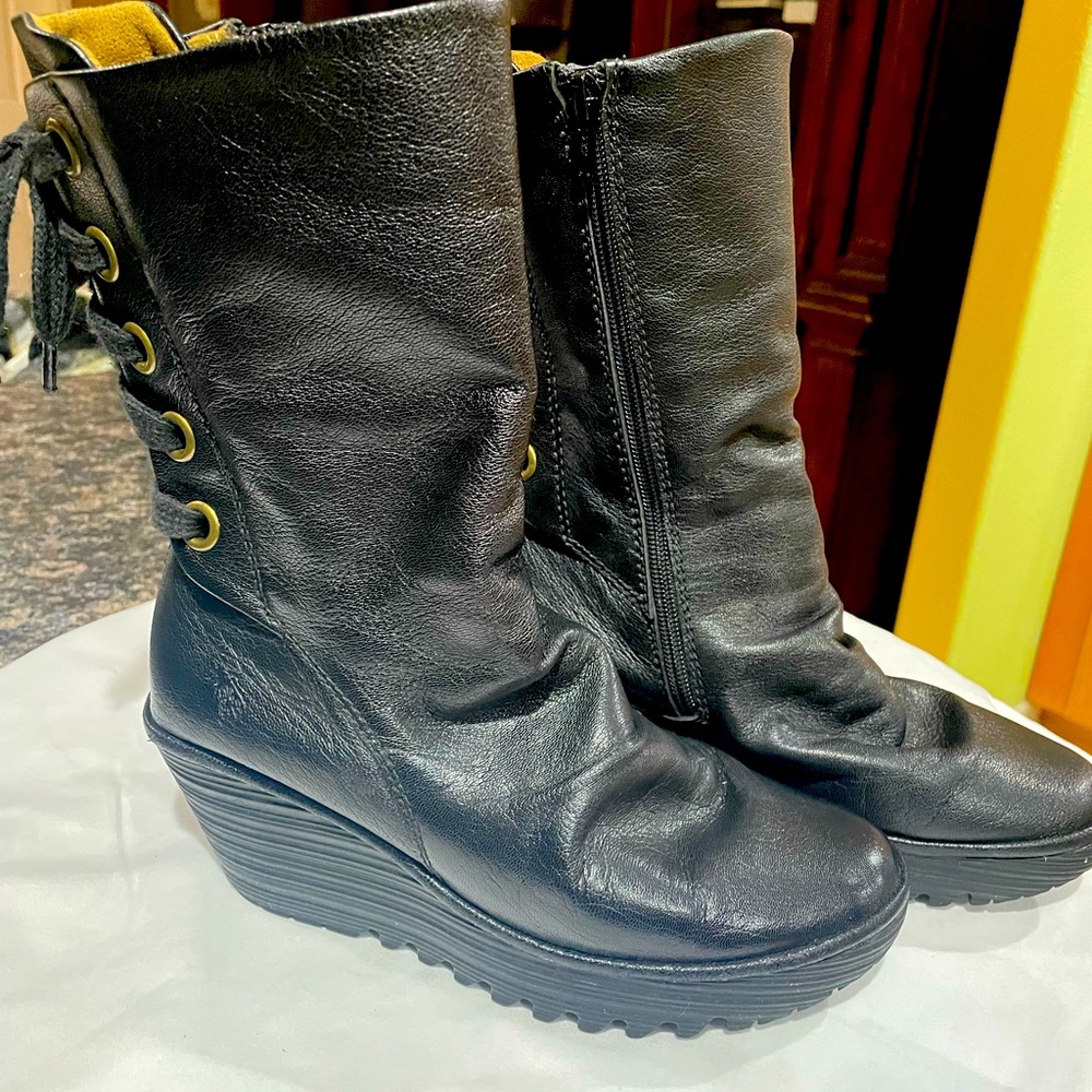 Women’s Fly London leather boots size 38 in Black, excellent condition.